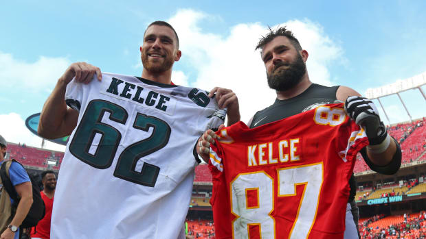 Sep 17, 2017; Kansas City, MO, USA; Kansas City Chiefs tight end Travis Kelce (87) swaps jerseys with Philadelphia Eagles center Jason Kelce (62) after the game at Arrowhead Stadium. Mandatory Credit: Jay Biggerstaff-USA TODAY Sports